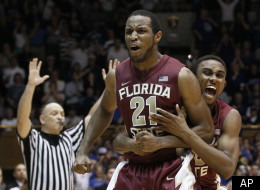 Florida State's Michael Snaer (21) and Ian Miller celebrate Snaer's game-winning basket against Duke during the second half of an NCAA college basketball game in Durham, N.C., Saturday, Jan. 21, 2012. Florida State won 76-73. (AP Photo/Gerry Broome)