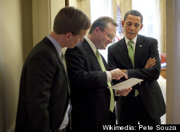Tommy Vietor, Robert Gibbs and President Barack Obama take part in a March Madness pool in 2009 -- a tactic to up White House productivity?