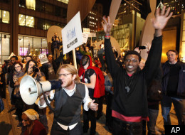 Protesters march in the streets of Chicago on Wednesday, Nov. 2, 2011, to join a national day of protests in solidarity with Oakland, Calif. (AP Photo/Charles Rex Arbogast)