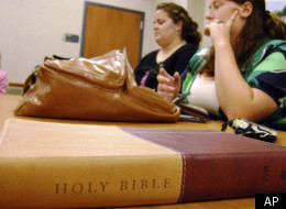 Two unidentified member of Alpha Delta Chi pray before the chapter meeting on Wednesday, Oct. 8, 2008, at Georgia Tech in Atlanta, Ga. (AP Photo/Peter Prengaman)