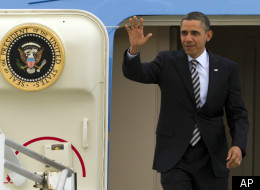 President Barack Obama arrives at Los Angeles International Airport in Los Angeles, Wednesday, Feb. 15, 2012. (AP Photo/Damian Dovarganes)