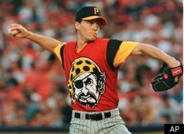 Sporting his uniform of the future, Pittsburgh Pirates pitcher Kris Benson throws a pitch against the New York