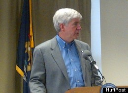 Michigan Gov. Rick Snyder speaks to reporters Monday, March 26, 2012 in Detroit.