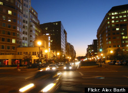 Downtown traffic moves along New York Avenue NW.