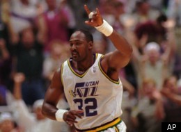 Utah Jazz Karl Malone (32) celebrates a basket in the May 30, 1996 game against the Seattle SuperSonics in Salt Lake City, Utah.