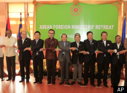 ASEAN countries' foreign ministers pose together during the ASEAN Foreign Ministers' Retreat in Siem Reap province, Cambodia, Wednesday, Jan. 11, 2012. (AP)