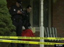 Cops investigate the scene of a grisly murder Wednesday which left a girl's new boyfriend, her mom and her killer ex-boyfriend dead.