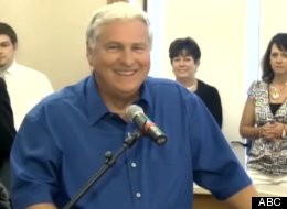Merle Butler accepting his winnings at a press conference in Illinois Wednesday.