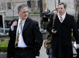 New Orleans Saints general manager Mickey Loomis, left, is followed by media as he arrives for a meeting at NFL headquarters in New York, Thursday, April 5, 2012. (AP Photo/Seth Wenig)
