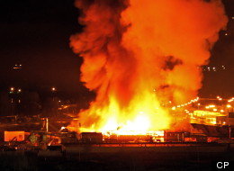 A large fire burns at the Lakeland Mills sawmill in Prince George, B.C., on Tuesday April 24, 2012. An explosion rocked the sawmill just before 10 p.m. local time setting off a fire that engulfed the facility. Full photo below. THE CANADIAN PRESS/Andrew Johnson