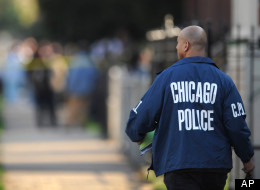 A Chicago police officer investigates a crime scene.