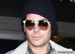Zac Efron returns to Los Angeles after promoting his new movie,