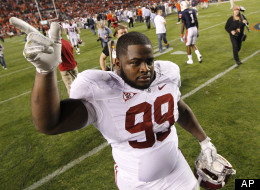 Alabama defensive lineman Josh Chapman (99) reacts at the end of a 42-14 win over Auburn, Nov. 26, 2011.