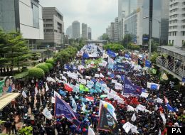 Phillippines citizens march through the capital, Manila, to celebrate May Day