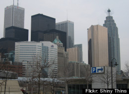 Standard & Poor's Ratings Services has revised its outlook from stable to negative on seven Canadian banks over concerns about unsustainably high home prices and consumer debt levels.