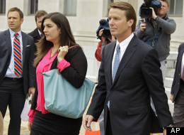 Former presidential candidate and U.S. Sen. John Edwards, right, leaves a federal court with his daughter Cate, left, in Greensboro, N.C., Monday, April 23, 2012. A former aide to Edwards has taken the witness stand in his criminal trial to testify about his role in allegedly violating campaign finance laws to cover up an extramarital affair. (AP Photo/Chuck Burton)