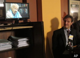 Viviette Applewhite appears via video at a press conference with her attorney, Witold J. Walczak of the American Civil Liberties Union