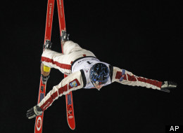 Olivier Rochon of Canada performs his jump during the men's aerials final FIS Freestyle Ski World Cup in Moscow, Russia, Saturday, March 10, 2012. (AP Photo/Mikhail Metzel)