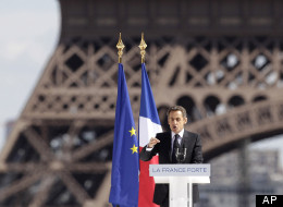 France's President and candidate for re-election in 2012, Nicolas Sarkozy, gestures as he delivers a speech during a campaign meeting at Tocadero square in Paris, Tuesday, May 1, 2012. Eiffel tower in the background. (AP Photo/Michel Euler)
