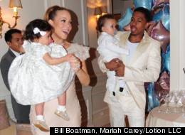 Mariah Carey and Nick Cannon carry twins Monroe and Moroccan in Paris. Credit: Bill Boatman, Mariah Carey / Lotion LLC