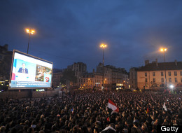 Supporters of Socialist Party (PS) candidate for the 2012 French presidential election celebrate at Place de la Bastille in Paris on May 6, 2012 after the announcement of the first official results of the French presidential final round. (FRANCK FIFE/AFP/GettyImages)