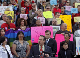 Openly gay state Senator Pat Steadman, center, speaks at a rally in support of Civil Unions at the Capitol in Denver on Tuesday, May 8, 2012. The rally pushed for the passage of a Civil Unions bill that must be debated on the House floor before it can be passed on Wednesday the final day of the Legislative session. (AP Photo/Ed Andrieski)
