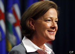 Alberta Premier Alison Redford trimmed her cabinet Tuesday, rewarded some veterans and promoted a controversial rookie to the critical post of energy minister. (CP)