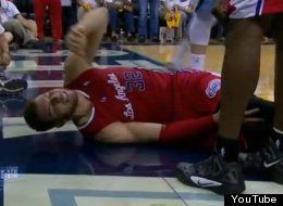 Blake Griffin is booed as he clutches his knee after suffering an injury in Game 5 against the Memphis Grizzlies.
