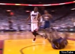 Dwyane Wade is called for a flagrant foul after knocking down Darren Collison on a fast break.