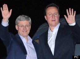 Le premier ministre canadien Stephen Harper et son homologue britannique David Cameron arrivent à Chicago pour assister au sommet de l'OTAN (19 mai 2012). (PC)