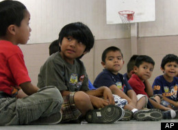 Students sit in the gym at Crossville Elmentary School in Crossville, Ala., Aug. 17, 2011. Despite being in an almost all-white town, the school's enrollment is about 65 percent Hispanic.