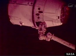 A SpaceX illustration of the Dragon capsule as it prepares to berth with the International Space Station.