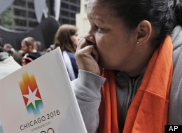 In this Oct. 2, 20099 file photo, a Chicago 2016 supporter reacts after Chicago was eliminated on the first vote in its bid to host 2016 Summer Olympic Games during an announcement ceremony at Daley Plaza in Chicago. (AP Photo/M. Spencer Green, File)
