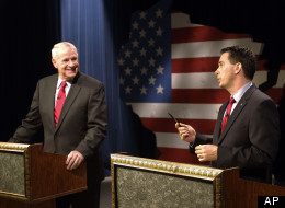 Milwaukee Mayor Tom Barrett (D) debating Wisconsin Gov. Scott Walker (R) on May 25, 2012.