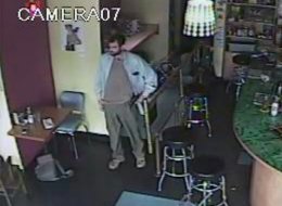 A gunman is on the loose after opening fire at a Seattle cafe, killing two people and wounding three others.