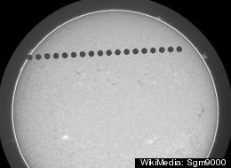 Transit of Venus across the Sun shown in stages.