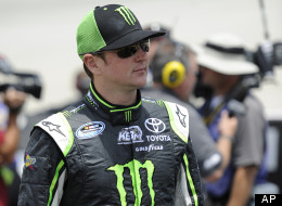 Sprint Cup Series driver Kurt Busch walks to his car during qualifying for the FedEx 400 benefiting Autism Speaks NASCAR Sprint Cup Series auto race, Saturday, June 2, 2012, in Dover, Del. (AP Photo/Nick Wass)
