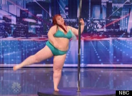 Lulu tries her hand at pole dancing on