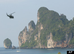 A helicopter delivering supplies leaves Phi Phi Island Tuesday, Dec. 28, 2004, in Thailand. (AP Photo/Suzanne Plunkett)
