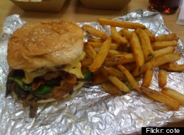 Five Guys has agreed in a lawsuit settlement to give $50 gift certificates to many gift card holders, since the restaurant chain illegally charged a $2 monthly fee to gift cards that were not used for 12 months.