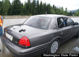 The rear window frame of this trooper's vehicle was torn loose and the arrestee -- who allegedly threw his wife out of his car -- got out and attacked an officer.