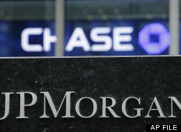 This May 14, 2012, file photo, shows the corporate logos for JPMorgan Chase in New York. (AP Photo/Mark Lennihan, File)