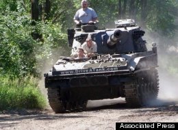 A business called Drive-a-Tank in Minnesota allows customers to drive military tanks around a quarry and crush junk cars -- just like in the movies.