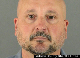 The booking photo for former DARE Officer Michael Mangino, 51. Mangino was a 29-year veteran of the Aurora Police Department.
