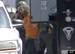 An alleged hoarder is in custody Friday after an hours-long standoff with police.