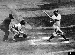 Babe Ruth of the New York Yankees clouts a towering home run in this undated photo. (AP Photo)
