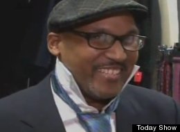 An unemployed man tries on a suit at Career Gear on the <em>Today Show</em>.