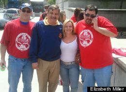 Elizabeth Miller at a rally to save her job.