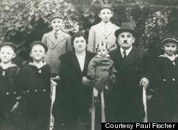 Matyas Fischer with his wife and six sons in their backyard in Serbia (then in Yugoslavia) around 1938. The youngest child is Paul Fischer, the lead plaintiff in a lawsuit against several European banks.