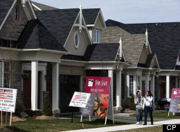 The Canadian Real Estate Association says there were fewer sales of previously owned homes last month, down 1.3 per cent from May and down 4.4 per cent from June 2011. (CP)